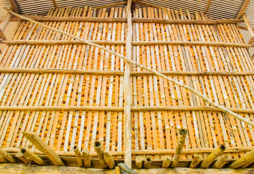 The Barn of Corn made from wood and bamboo.