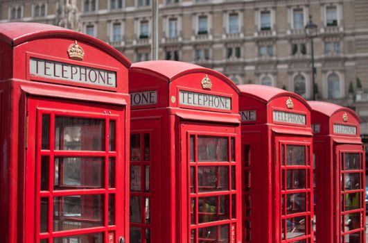 Row of red telephone boxes