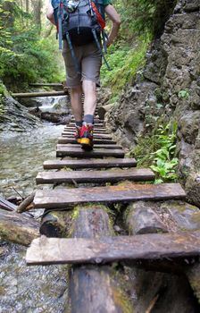 Slovakian Paradise, SLOVAKIA - JULY 05: Unknown Hiker in Slovakian Paradise National Park in Slovakian Paradise, Slovakia on July 05, 2014