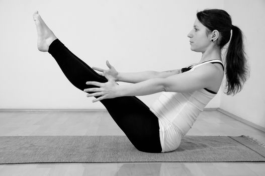 Young girl doing yoga pose