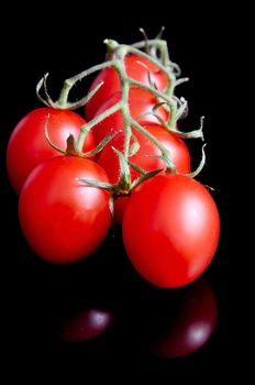 Tomatoes on black