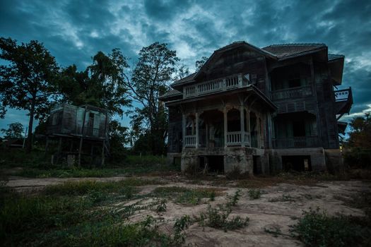 abandoned wood old house on twilight