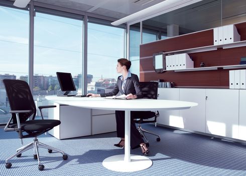 businesswoman working in her office