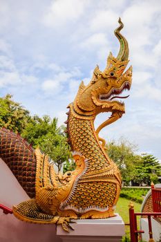 Naga statue at buddhist temple in lampang, thailand