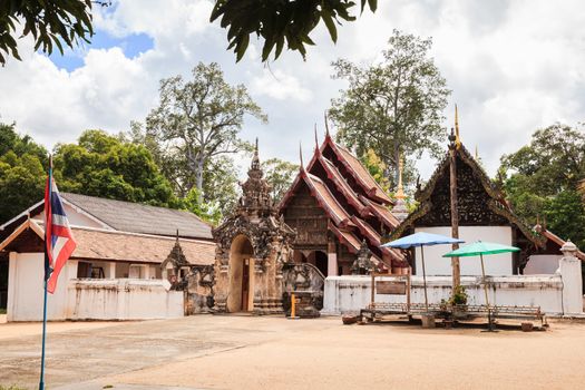 Ancient lanna style temple that having very beautiful carving at  facade of the viharn