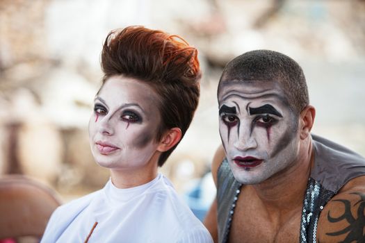 Attractive mixed male and female cirque performers backstage