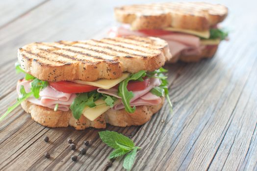 Grilled deli sandwiches with ham and cheese 
