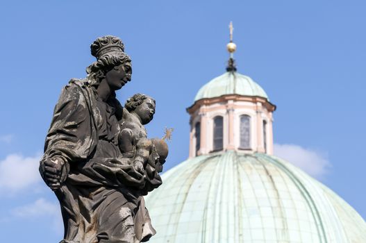 Virgin Mary and child Christ statue on the Charles Bridge, Prague, Czech Republic.
