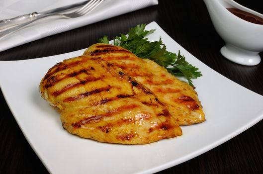grilled piece of roasted chicken schnitzel
