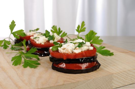Baked eggplant with ricotta and tomato