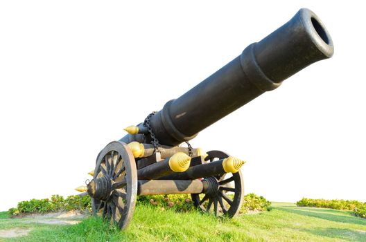 Cannon on wheels moving in grass. Thailand's ancient weapons on white background