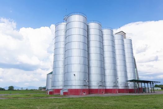 Grain storage silos.Tall storage tanks
