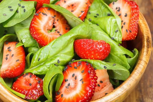 Strawberry Spinach Salad with Poppy seed and sesame dressing. Close up