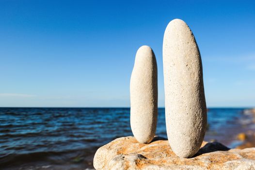 Balancing of two stones on the seacoast