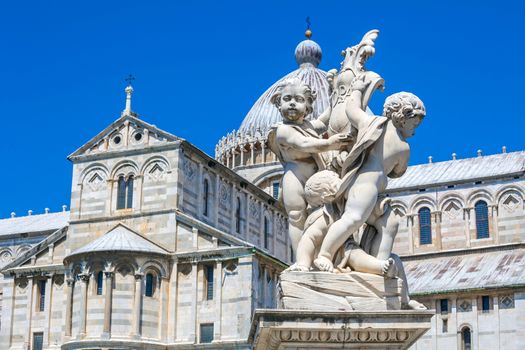 Pisa, Italy - August 11, 2013: Pisa Duomo and The Fountain with Angels in Pisa, Italy