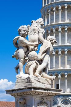 Pisa, Italy - August 11, 2013: Pisa Duomo and The Fountain with Angels in Pisa, Italy