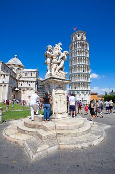 Pisa, Italy - August 11, 2013: Pisa Duomo and The Fountain with Angels in Pisa, Italy