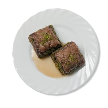 Plate with turkish baklava isolated over white background