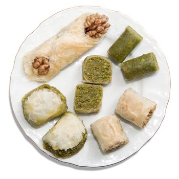 Plate with turkish baklava isolated over white background