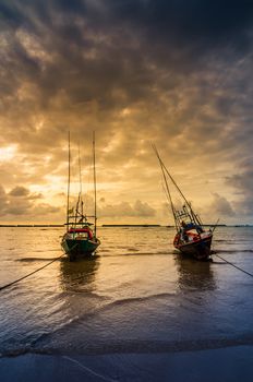 Fishing sea boat and Sunrise clouds before strom in Thailand blue  light tone