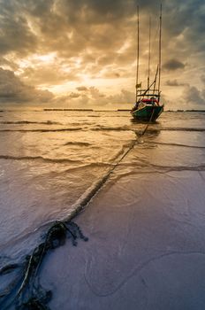 Fishing sea boat and Sunrise clouds before strom in Thailand blue  light tone