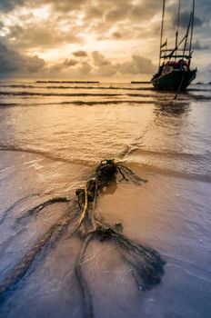 Fishing sea boat and Sunrise clouds before strom in Thailand blue  light tone