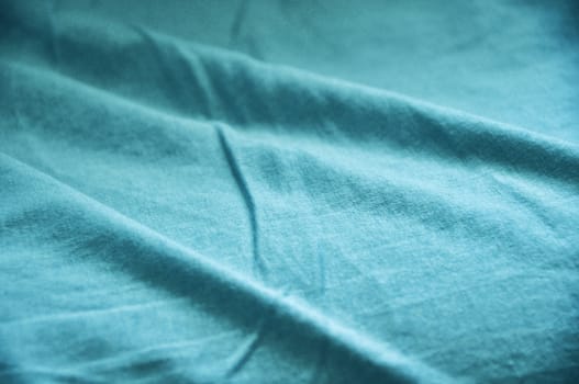 texture of cotton cloth with shadows, vivid color and deep blue