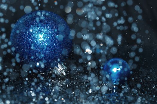 Close-up view of Christmas balls under the rain