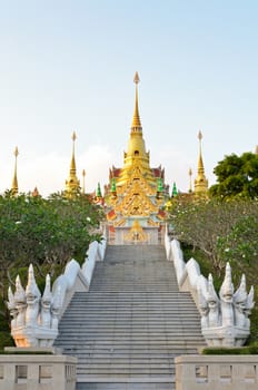 Stairs to Phra Mahathat Chedi Phakdi Prakat, Beautiful golden pagoda's famous on Thongchai mountain at Ban krut in Prachuap Khiri Khan province of Thailand
