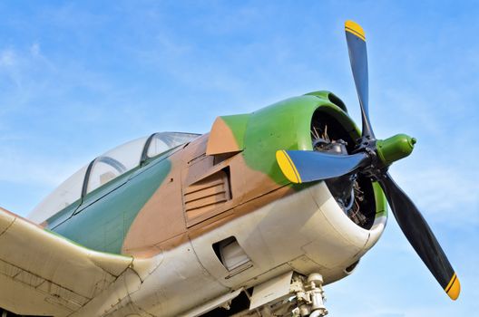 Old fighter aircraft used in world war 2 of Thailand on blue sky background
