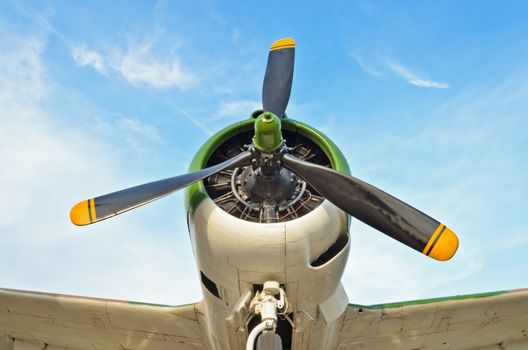 Old fighter aircraft used in world war 2 of Thailand on blue sky background
