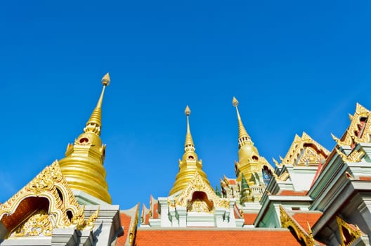 Pinnacle at Phra Mahathat Chedi Phakdi Prakat, Beautiful golden pagoda's famous on Thongchai mountain in Ban krut, Prachuap Khiri Khan, Thailand
