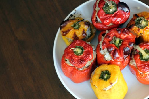 Roasted peppers with minced meat and rice inside