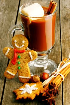 Glass of hot chocolate on wooden table