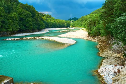 Alpine landscape with river stream