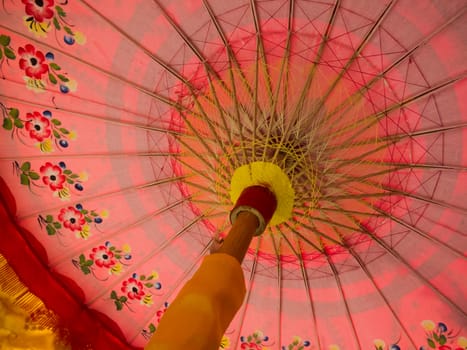 Traditional Red Minangkabau and Bali Pink Umbrella