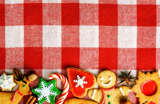 Christmas gingerbread cookies over tablecloth