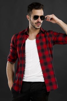 Studio portrait of a handsome young man posing