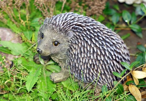 Garden statue of a hedgehog in the garden