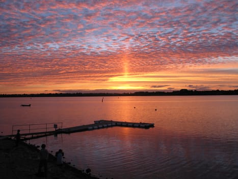 beautiful sunset over draycote water lake