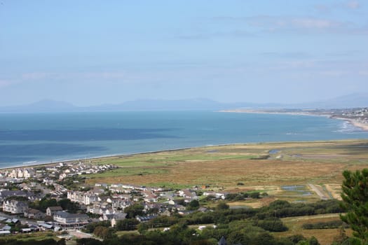 a view over sunny cardigan bay from the hills above