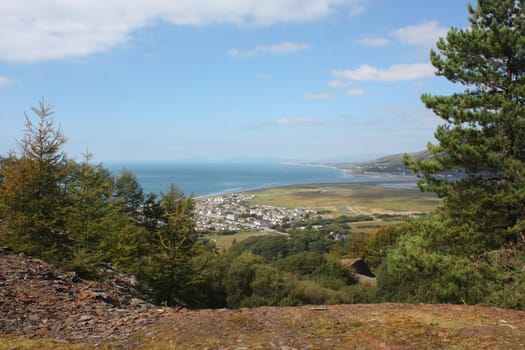 a view over sunny cardigan bay from the hills above