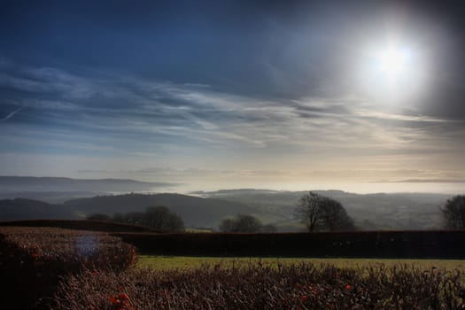 cloud or mist in a valley in exmoor national park