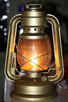 a glowing hurricane lamp