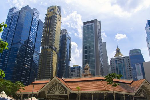 Singapore Skyscrapers and Church. Afternoon in City  EDITORIAL Singapore, Singapore - February 13, 2014