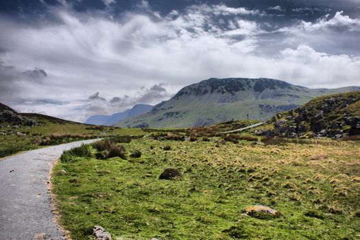 Stunning welsh mountains under a cloudy blue sky