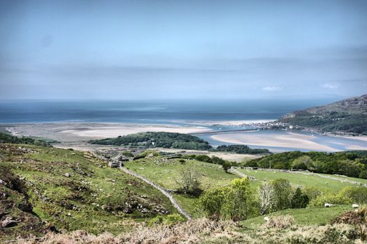 Stunning welsh mountains under a cloudy blue sky