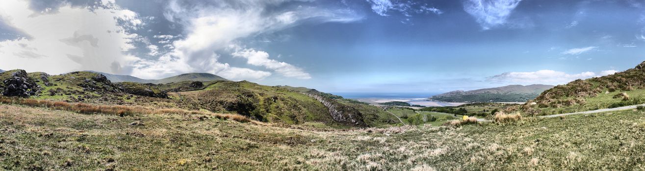 Stunning welsh mountains under a cloudy blue sky