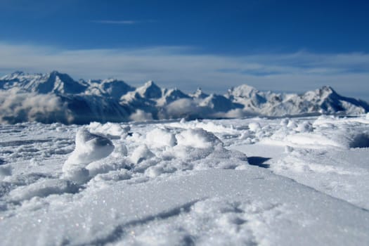 snow covered mountain peaks in the alps