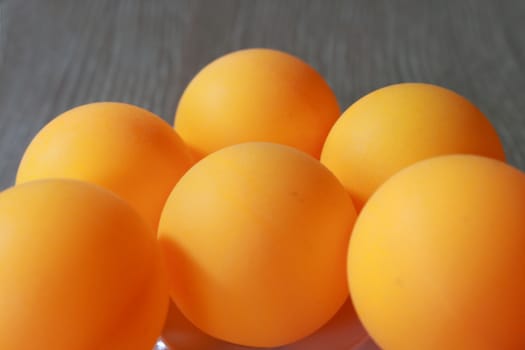 There are many table tennis balls which have orange colour.